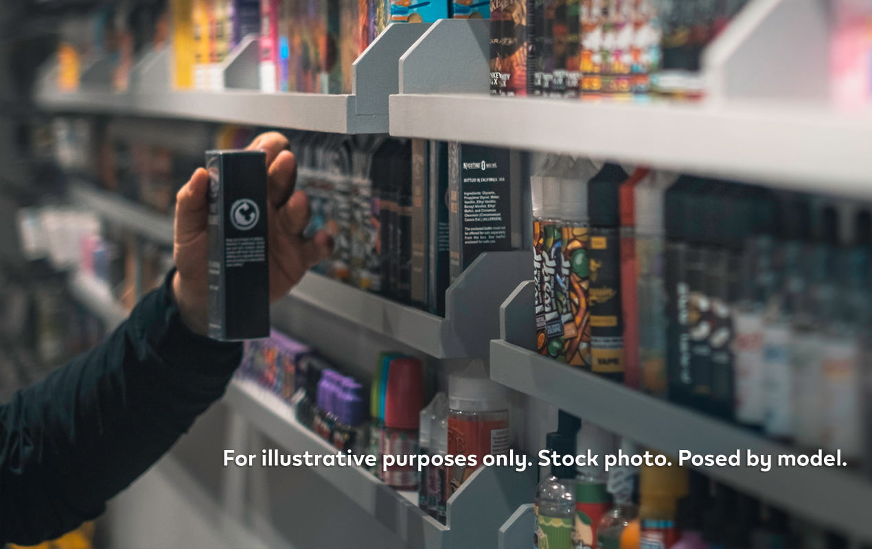 Shelves stocked with vape e-liquids